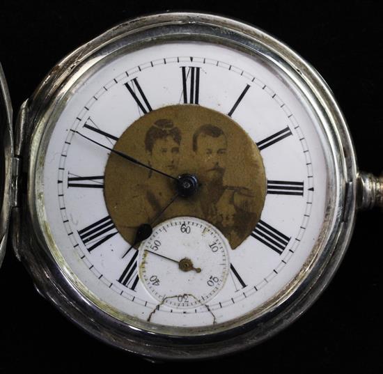 An early 20th century Russian engine turned 84 zolotnik silver military related hunter keywind pocket watch,